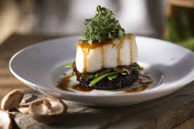 Seasons 52 signature dishes Asian-glazed Chilean Sea Bass Wood-grilled Boneless Rainbow TroutAhi Tuna Tartare